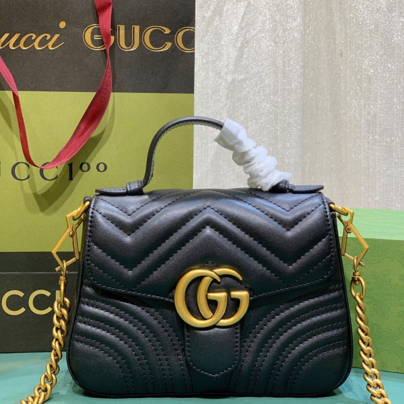 G*u*i top handle bags